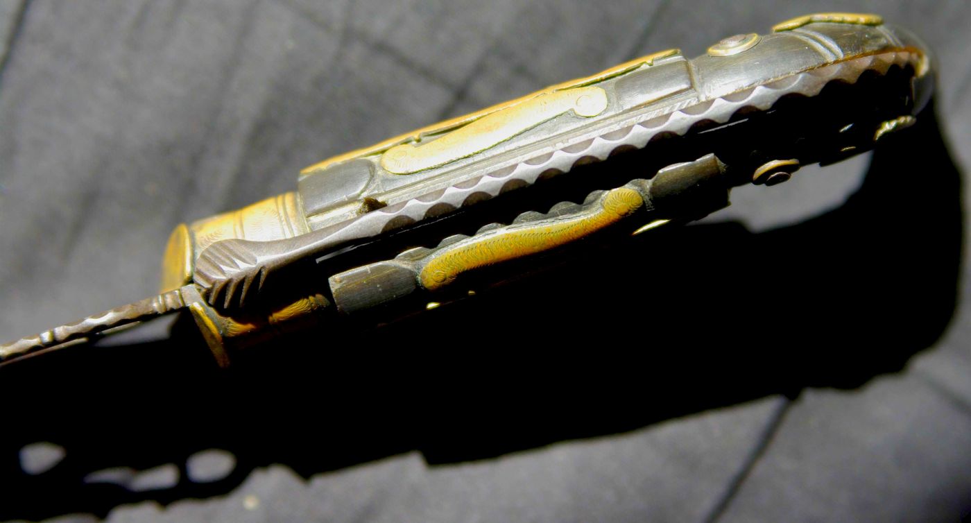 Ornate Clasp Knife with open work, file work, brass trim